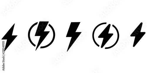 Bild auf Leinwand Five black lightning bolt arranged in a horizontal row on a solid black backgrou