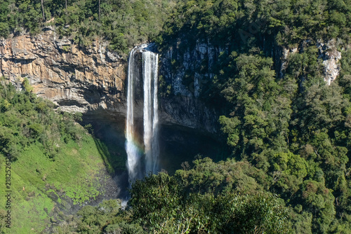 Canela - Caracol Falls waterfall with rainbow cascading over cliff, Rio Grande do Sul in Brazil