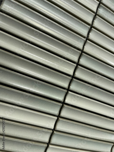 Red Steel Structural Frame Viewed from Below Between Buildings