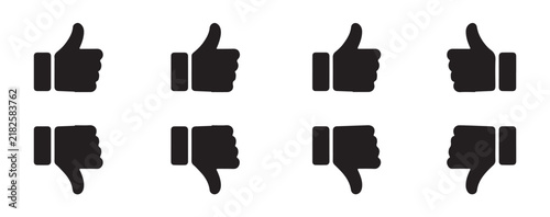 Bild auf Leinwand Multiple thumbs up and thumbs down icons in solid black for showing agreement and disagreement on social media