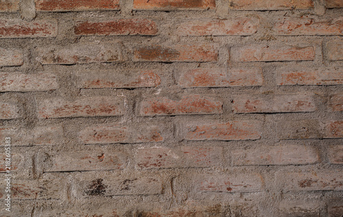 Bild auf Leinwand Pared de ladrillo envejecido con textura rústica y superficie de construcción de