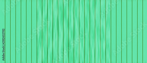Fotografie A teal wooden panel texture displays a vertical grain and consistent coloration