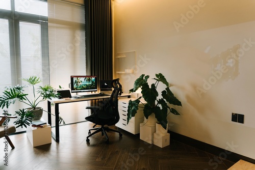 Modern Professional Office Workspace with Contemporary Interior Design, Business Desks, Computer Workstations and Creative Corporate Work Environment