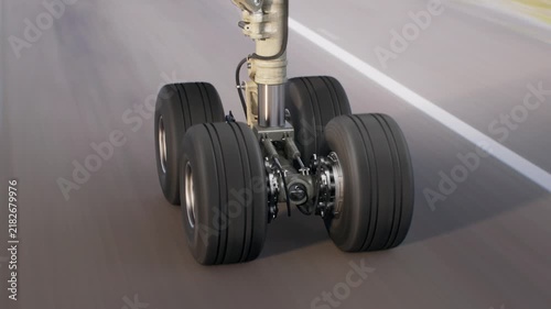 View on airplane wheel at landing, close up shot