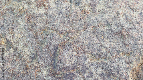 Cuadro en lienzo Natural weathered stone texture with rough gray and brown mineral patterns