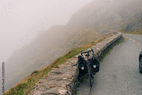 Cuadro en lienzo Touring bicycle with panniers on a misty mountain road on the Dingle Peninsula, County Kerry, Ireland - 4 September 2026