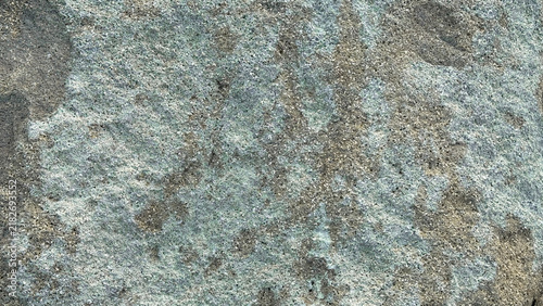 Fotografía Natural rough stone surface texture with grey and green mineral patterns for bac