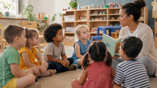 Diverse preschool children listening to teacher reading story, kindergarten students in classroom, early childhood education and literacy