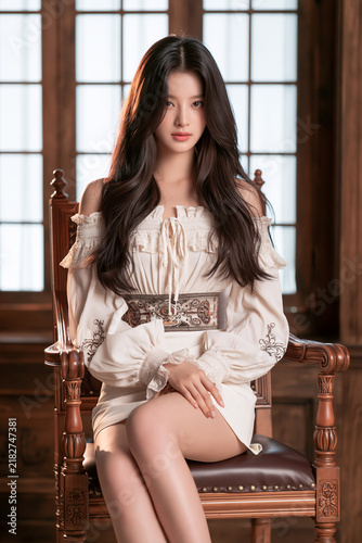 beautiful korean idol girl sitting on chair by large window, realistic portrait, korean woman in elegant blouse and miniskirt indoors, photorealistic korean fashion model sitting near window