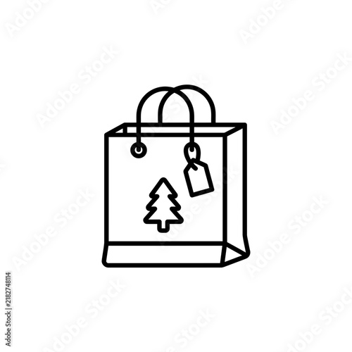 Shopping bag icon with Christmas tree design and gift tag sits isolated on white.