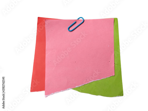 Colorful paper sheets clipped together with binder