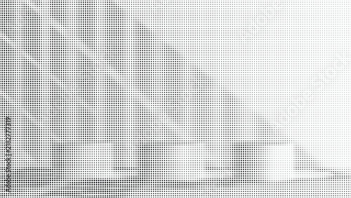 Abstract monochrome halftone pattern with circular gradient dots on white background.