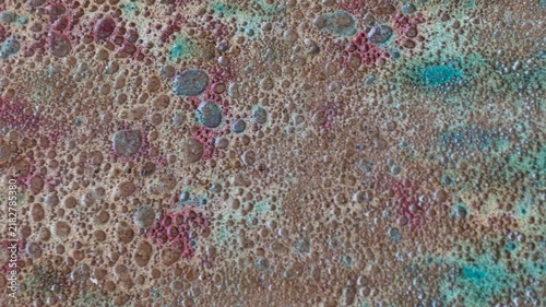 Abstract concrete texture with colorful spots