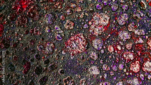 Abstract textured concrete background with purple hues