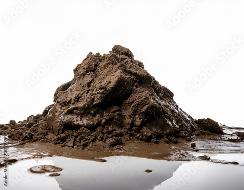 wet mud pile forming a small hill on white background