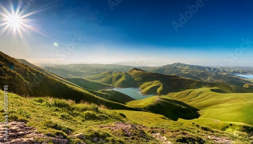 sun kissed landscape of rolling hills verdant valleys and sparkling waters evoking a sense of promised land abundance as seen from nebo s majestic vantage point
