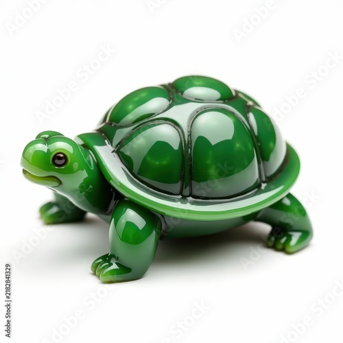 Glossy jadeite turtle carving with rounded segments and green finish on white background