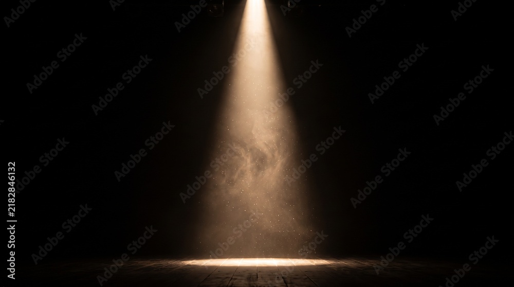 Fototapeta premium Bright theatrical spotlight shining from above with warm glowing light beam and smoky haze on a dark stage background