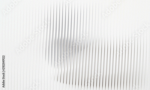 Abstract background of vertical lines with soft shadows and light gradients, creating a textured and minimalist visual effect