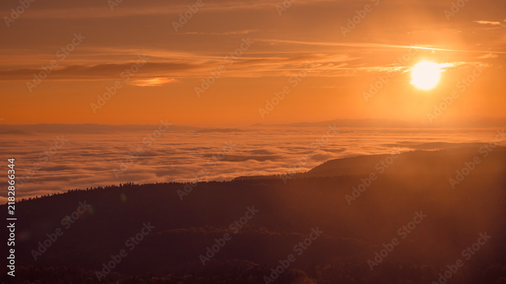 Obraz premium sunset over the clouds