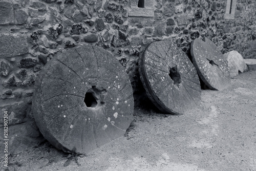 Canvas Print Historic millstones at El Pobal ironworks in Muskiz, Bizkaia, Basque Country, Sp