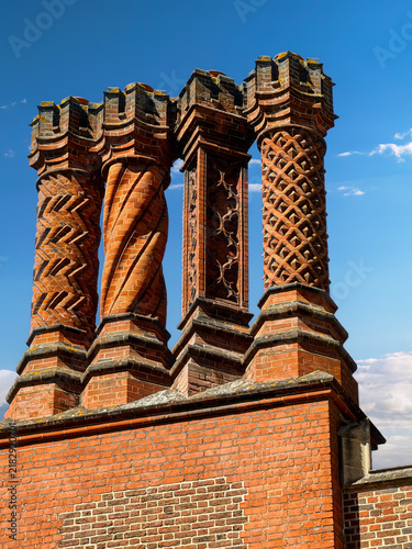 Intricate Tudor ornamental brick chimneys at Hampton Court Palace, London