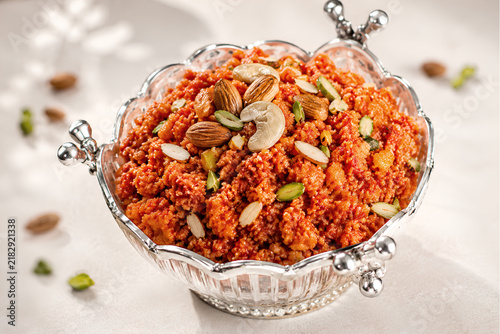 Nut Topped Gajar Halwa in an Elegant Decorative Serving Bowl