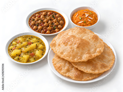 Traditional Pakistani Halwa Puri Breakfast with Chana and Aloo