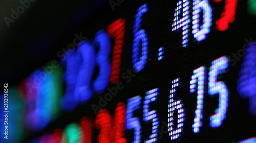 Colorful Glowing Numbers on Dark Screen with Shallow Depth of Field and Bokeh - Data Concept