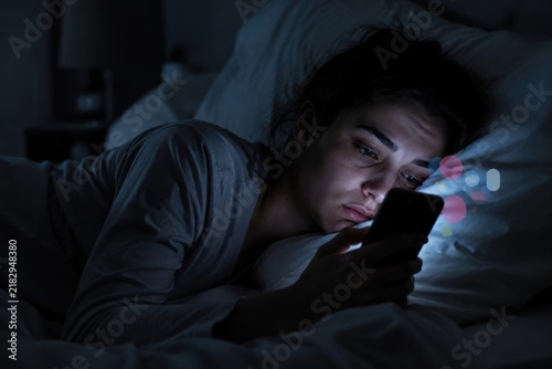 Obraz na płótnie Smartphone in Bed at Night