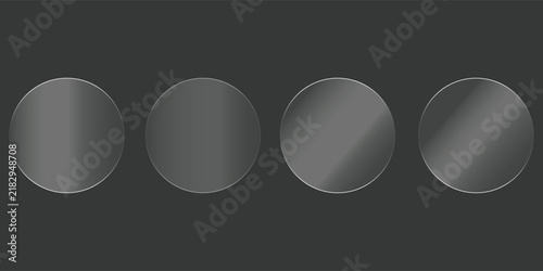 Four circular glass buttons with subtle gradient reflections, arranged in a horizontal row against a dark gray background
