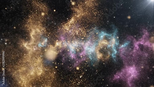 Abstract space background with glowing golden and blue particles floating in deep galaxy.