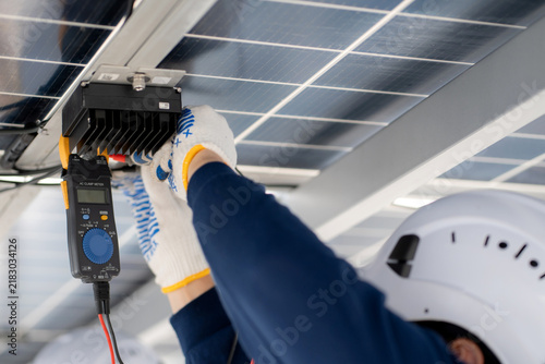 Team man engineer inspection maintenance solar panel, renewable energy, installation and photovoltaic system control service, sustainable energy, two technician inspect solar power efficiency.