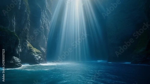 Divine light coastal rays shining through sea cave cliffs