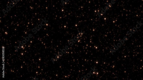 Loop animation gold particles flow on black abstract background. 4K 3D animation of fiery red gold glowing flying ember burning ash particles.