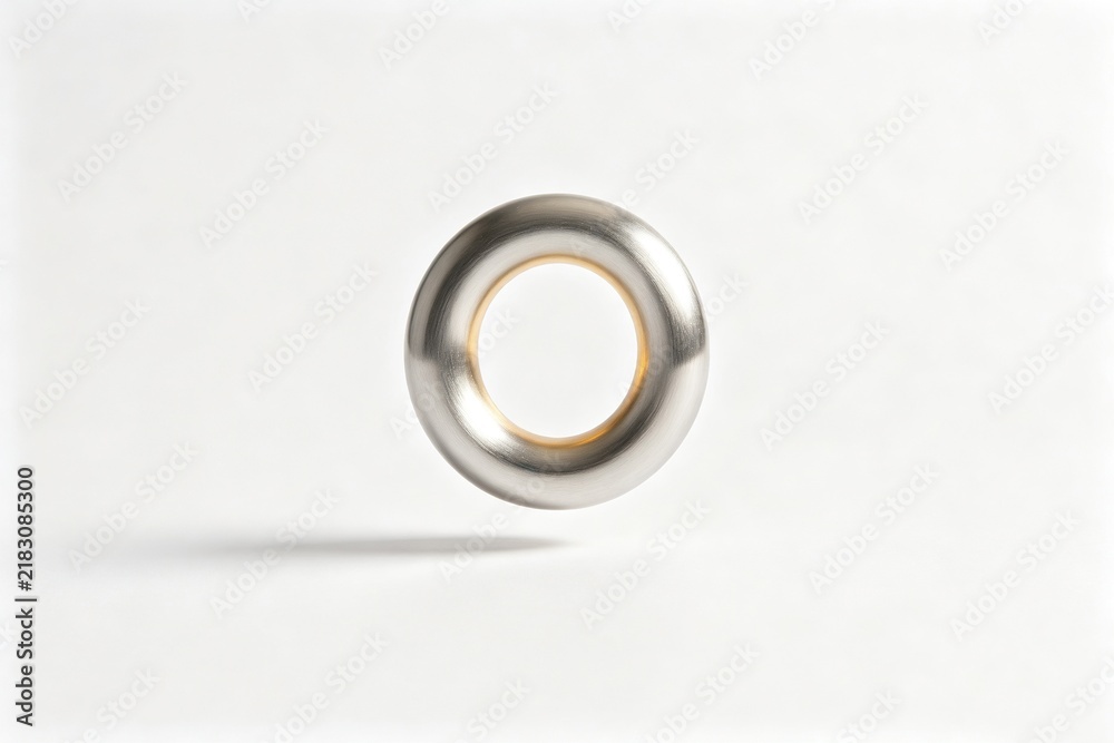 Obraz premium Minimalist Floating Metallic Ring, Brushed Silver Perfect Circle White Background
