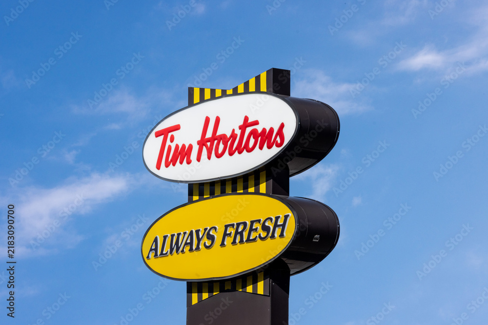 Obraz premium Toronto, Canada, September 6, 2026; A classic Tim Hortons Always Fresh sign at a drive through coffee shop location