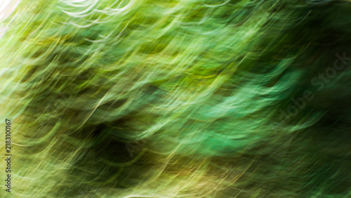 Принти на полотні Abstract wavy intentional camera movement icm of bright green foliage