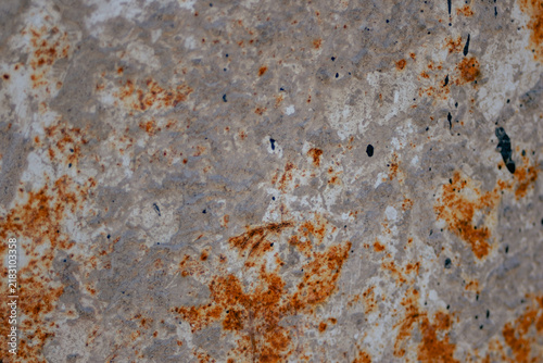 Fotografie Rusty metal texture background showing corrosion and decay on an iron surface, creating an abstract pattern with rough details and shadows, representing industrial grunge