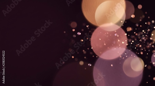 Abstract background with soft golden and pink bokeh circles