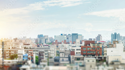 Aerial view of city skyline with skyscrapers and blurred foreground in Taiwan, miniature tilt shift effect