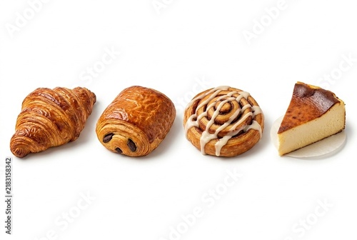 Set of four artisan cafe pastries and bakery desserts isolated on white background