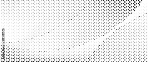 Abstract geometric triangle halftone pattern with black and grey gradient on white background