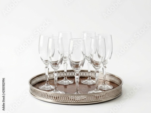 Set of Empty Wine and Cocktail Glasses Arranged on a Decorative Silver Serving Tray