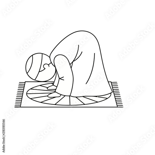 Person praying on a rug