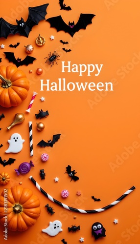 A vibrant Halloween celebration set against a striking orange background. A multitude of Halloween themed decorations are scattered around, creating an atmosphere of fun and festivity.