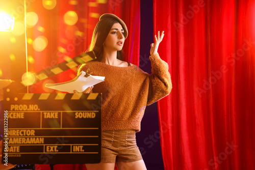 Bild auf Leinwand Acting audition and casting call, young woman practicing lines with script on fi