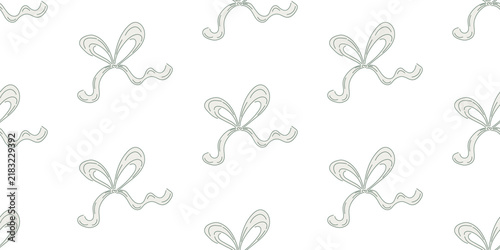 Beautiful seamless pattern with elegant bows embodies Christmas coziness. Soft lines, classic colors, and a sense of Xmas wonder make this print perfect for gift wrapping, holiday textiles, or cards