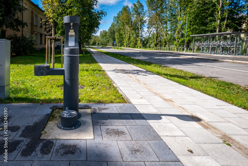 Modern Public Drinking Fountain Beside an Accessible Urban Sidewalk