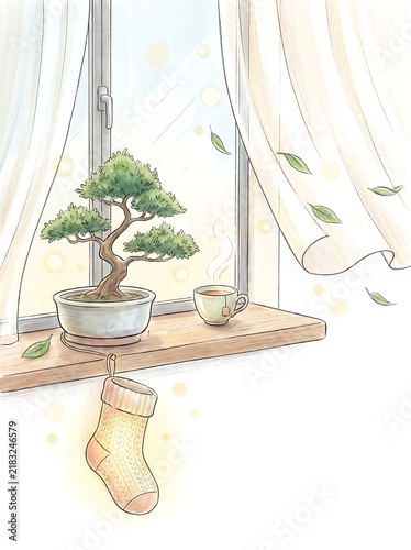 Windowsill with a bonsai tree, warm tea and a hanging Christmas stocking